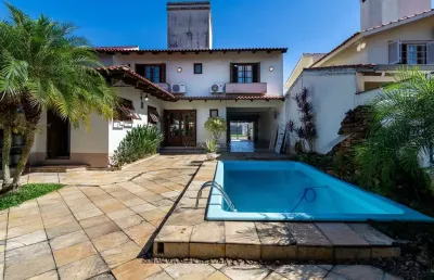 Casa com 3 quartos à venda na rua adão pinheiro da silva, --, ipanema, porto alegre por r$ 1.272.000