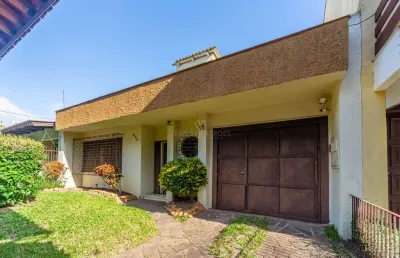Casa com 3 quartos à venda na rua márcio dias, --, nonoai, porto alegre por r$ 550.000