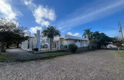Casa com 3 quartos à venda na rua pinaré, --, vila assunção, porto alegre por r$ 1.500.000
