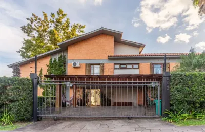 Casa com 4 quartos à venda na rua caeté, --, vila assunção, porto alegre por r$ 2.700.000