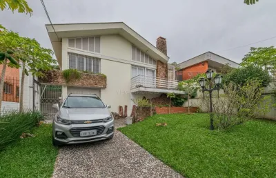 Casa com 3 quartos à venda na rua manauê, --, vila assunção, porto alegre por r$ 1.200.000