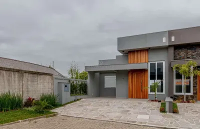 Casa em condomínio fechado com 3 quartos à venda na avenida juca batista, --, hípica, porto alegre por r$ 699.000