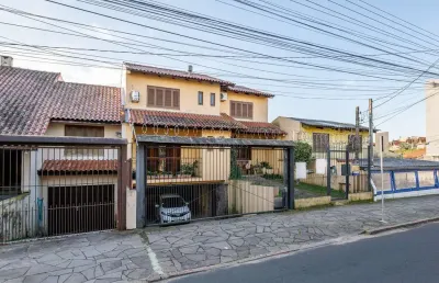 Casa com 3 quartos à venda na rua doutor mário totta, --, tristeza, porto alegre por r$ 870.000