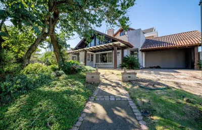 Casa em condomínio fechado com 3 quartos à venda na avenida juca batista, --, belém novo, porto alegre por r$ 2.400.000