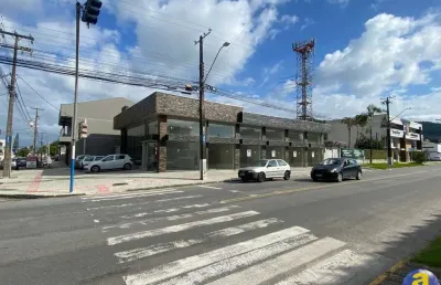 Loja para locação anual em guaratuba -sala comercial, 38,00 m2 útil, 2 banheiros e espaço descoberto nos fundos.