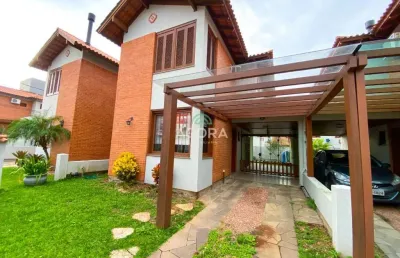 Casa em condomínio fechado com 3 quartos para alugar no igara, canoas  por r$ 4.000