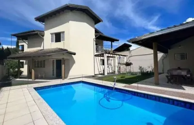 Casa de condomínio para venda com 325 metros quadrados com 4 quartos