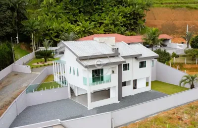 Casa com 4 quartos à venda na artur sardagna, 85, caixa d'água, guaramirim, 189 m2 por r$ 990.000