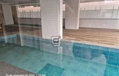 Apartamento com 2 dormitórios à venda, 60 m² por r$ 429.000 - caiçara - praia grande/sp