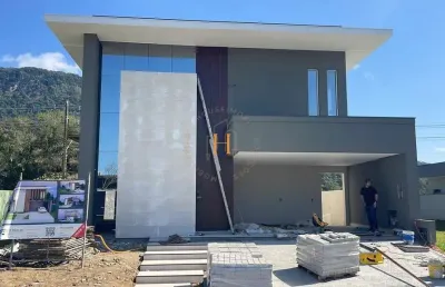 Casa em condomínio fechado com 4 quartos à venda na rua lagoinha, 65, pedra branca, palhoça por r$ 3.500.000