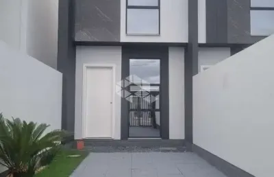 Casa sobrado à venda - 2 dormitórios e 2 vagas de garagem em tijucas - sc