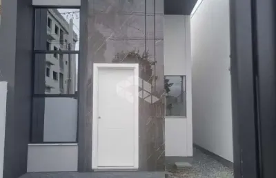 Casa à venda em tijucas - 2 dormitórios, 1 suíte e pé direito alto