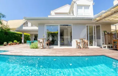 Casa com 5 quartos à venda na avenida dos búzios, 1520, jurerê internacional, florianópolis, 376 m2 por r$ 8.000.000