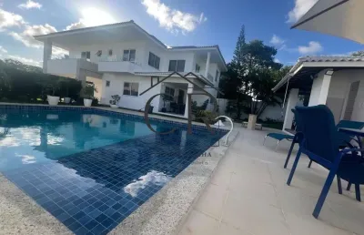 Casa em condomínio fechado com 4 quartos para alugar na 1ª Travessa Busca Vida, Abrantes, Camaçari