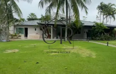 Um luxo de casa térrea com 5 suítes no condomínio encontro das águas!