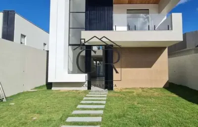 Maravilhosa casa com 3 suítes em condomínio com total infraestrutura!