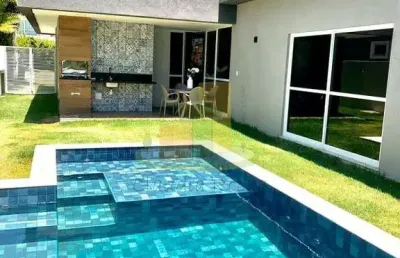 Linda casa térrea no alphaville litoral norte 1, pronta para morar!!