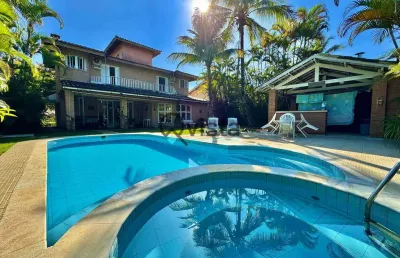 Casa à venda em condomínio fechado na praia da enseada, guarujá, sp | qvista inteligência imobiliár