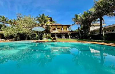 Casa de luxo estilo colonial com 7 suites à venda, jardim acapulco no guarujá | qvista inteligência