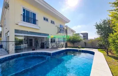 Casa a venda em condomínio alto padrão 4 suites escritorio