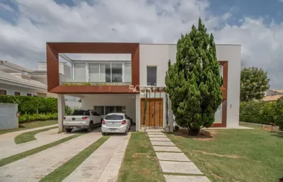 Casa à venda e locação no condomínio village castelo, 5 suítes, 600m² de área construída, próximo ao parque da cacau show, cacau park