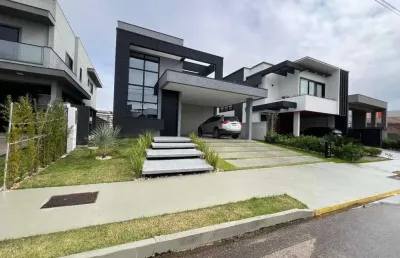 Casa térrea no condomínio caledônia em camboriú, com 203m² privativos, em um terreno de 430m².