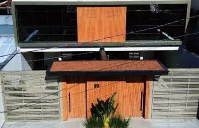 Triplex geminado com rooftop e piscina spa – conforto e sofisticação em cada detalhe