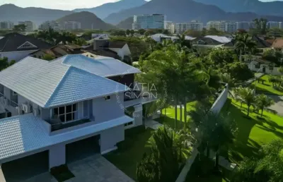 Casa de luxo à venda de 1.096 m² no condomínio mansões, barra da tijuca, rj – exclusividade e sofisticação