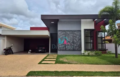 Casa térrea com 3 suítes localizada no condomínio damha.