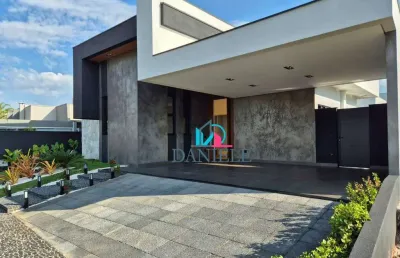 Casa térrea com 3 suítes localizada no condomínio damha.