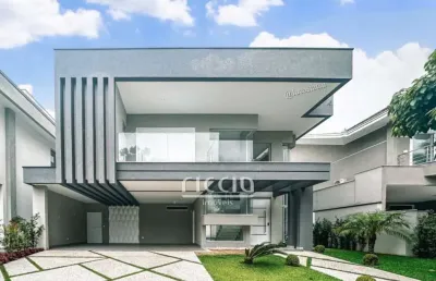 Ri6756 - casa em condomínio no golfe 3, 450 m² de terreno e 405 m² de área construída - 4 suítes.