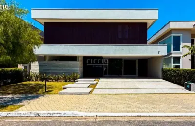 Sobrado luxuoso - muita privacidade - 480 m² útil - 3 suítes (*sala revers. 4º suíte) + escritório. cond. jardim do golfe 3 - com elevador 4  vagas