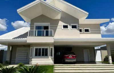 Linda casa de 366m2 área construída no condomínio reserva do paratehy - 4 suítes