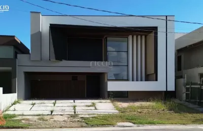 Sobrado com fachada moderna e imponente à venda no condominio vivant urbanova, com 5 suítes