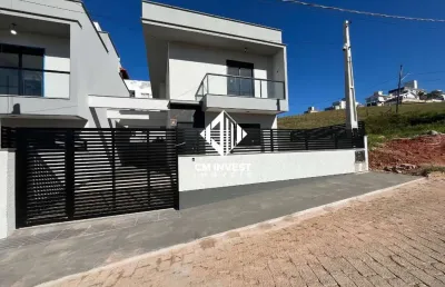 Sobrado à venda no loteamento ana clara - 3 quartos e suíte em areias - 105m² sao jose sc