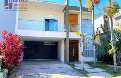 Condomínio fechado de alto padrão, sobrado com 3 suítes, escritório, piscina e espaço gourmet, planejados em todos os cômodos.