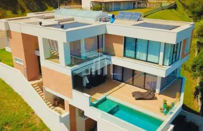 Casa com 604m² a venda ou aluguel por r$ r$ 26.000/mês em  alphaville/sp