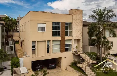 Linda casa com 5 suítes, 7 banheiros, com 441m² em alphaville - sp.
