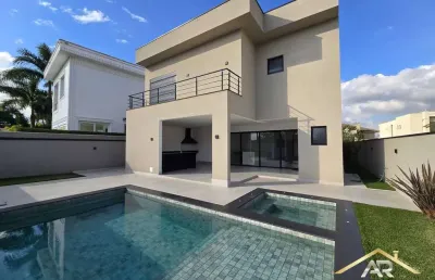 Belíssima casa em cond. com 5 sts, 6 wc, 4 vagas, 505m² - tamboré - sp.