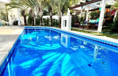 Casa com 6 quartos para alugar na rua dos camuris, 72, jurerê internacional, florianópolis, 390 m2 por r$ 38.000