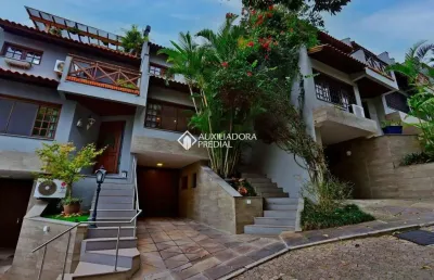 Casa em condomínio fechado com 4 quartos para alugar na rua landel de moura, 1505, tristeza, porto alegre, 340 m2 por r$ 4.900