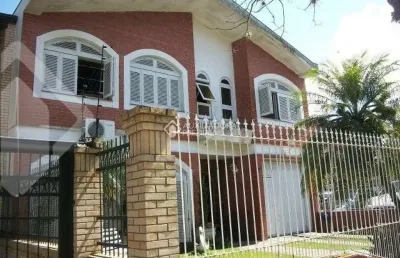 Casa em condomínio fechado com 4 quartos para alugar na rua vicente failace, 466, tristeza, porto alegre, 242 m2 por r$ 7.500