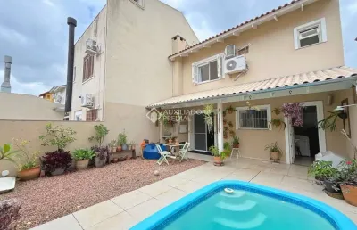 Casa em condomínio fechado com 2 quartos para alugar na rua guatambu, 280, hípica, porto alegre, 114 m2 por r$ 4.500