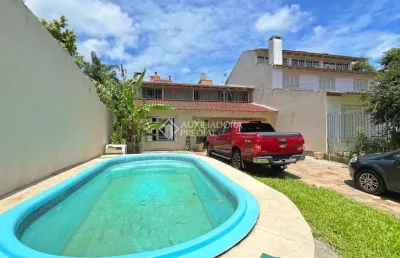 Casa em condomínio fechado com 4 quartos para alugar na rua joão palma da silva, 70, espírito santo, porto alegre, 203 m2 por r$ 5.500