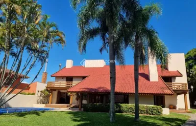 Casa em condomínio fechado com 5 quartos para alugar na rua potiguara, 245, vila assunção, porto alegre, 542 m2 por r$ 9.500