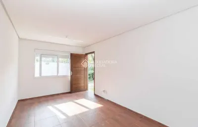 Casa em condomínio fechado com 2 quartos para alugar na rua santa mônica, 404, ponta grossa, porto alegre, 60 m2 por r$ 1.200