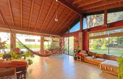 Casa em condomínio fechado com 4 quartos para alugar na rua doutor armando barbedo, 158, tristeza, porto alegre, 292 m2 por r$ 14.000