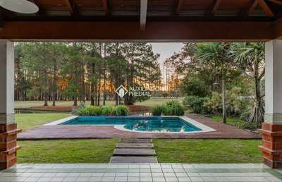 Casa em condomínio fechado com 4 quartos para alugar na avenida juca batista, 8000, chapéu do sol, porto alegre, 516 m2 por r$ 15.000