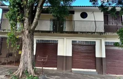 Sobrado com 2 salas comerciais  localização estratégica!