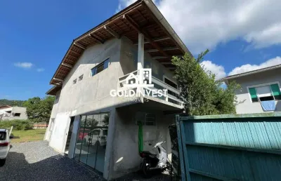 Casa com salas comerciais e amplo terreno no bairro guarani, brusque, sc